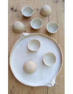 Plat sculpté motif masque