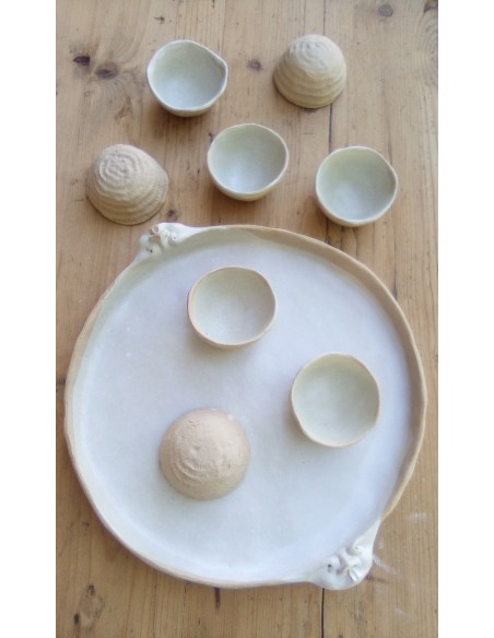 Plat sculpté motif masque