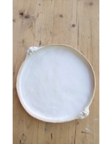 Plat sculpté motif masque Plat sculpté motif masque