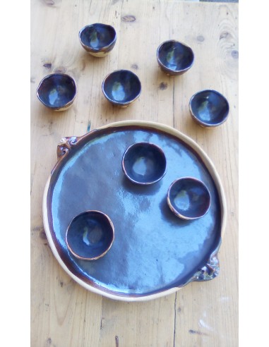 Plat sculpté motif masque Plat sculpté motif masque